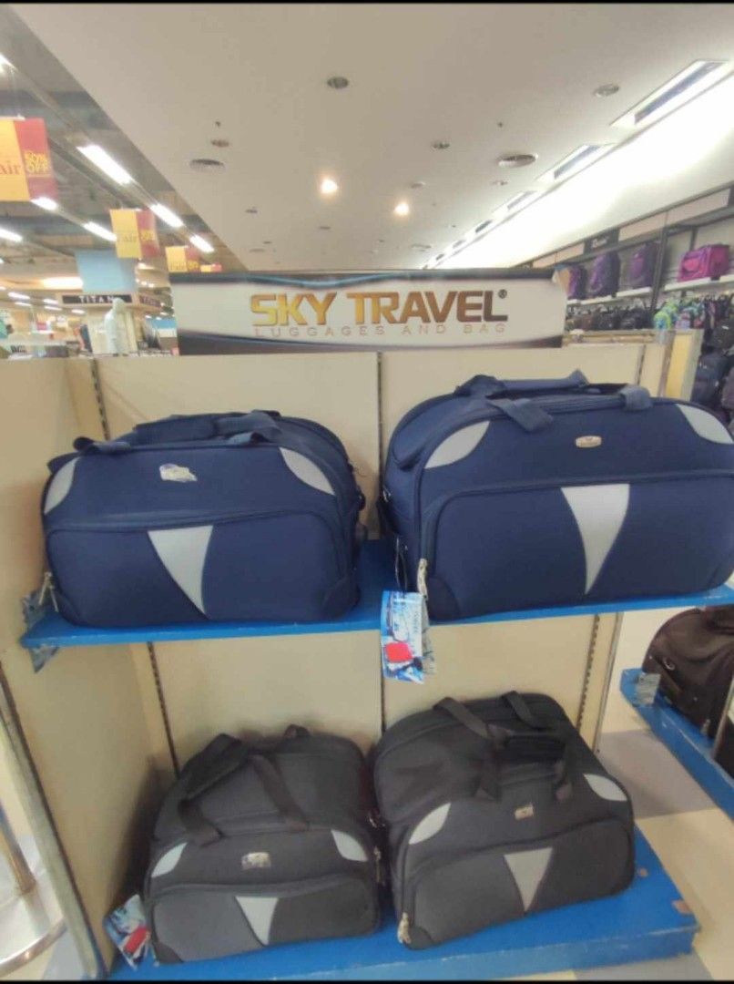 Sky Travel Duffle Bag - Blue (Category: Luxury Bags & Wallets) located in Bulacan. Submitted by finefindstuffbykdc_ (Listing ID 1401764452, Image 1). Description: - Sky Travel duffle bag - Color: Blue with grey accent - Price: ₱5,599.00 - Features top handles - Spacious and durable design - Ideal for travel and carrying many items.