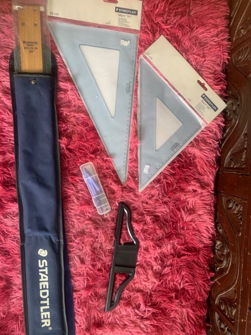 Staedtler T-square, Triangles, Compass, DRAFTING KIT (Category: Everything Else Others) located in Angeles City. Submitted by dar94826 (Listing ID 1401737723, Image 1). Description: PTPA Drafting kit for sale! 950 take all (negotiable if kunin po today/ sure buyer) Total value is around 2k po Staedtler triangle 60degree 36cm Staedtler triangle 45 degree 31cm Staedtler t-square 24inches FREE compass with lead refills Used for 1 semester only All i