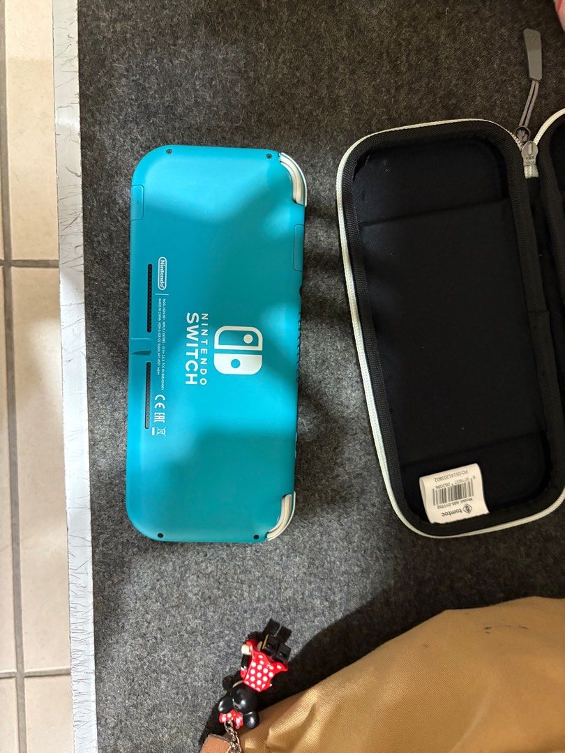 Switch lite (Category: Nintendo) located in Singapore. Submitted by supercarliftagilistic (Listing ID 1401745637, Image 2). Description: .