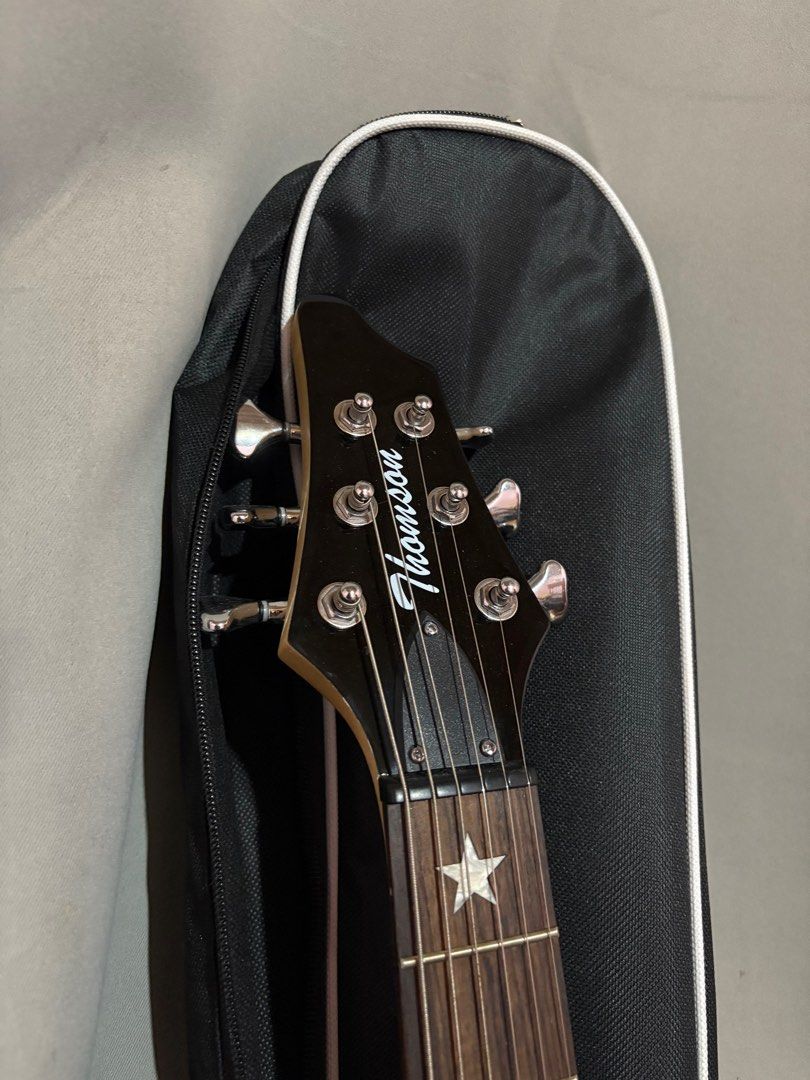 Thomson Electric Guitar with Case (Category: Musical Instruments) located in Dagupan City. Submitted by kiimiieeee (Listing ID 1401870494, Image 3). Description: Rfs: hindi na nagagamit Nego eg and bag only .