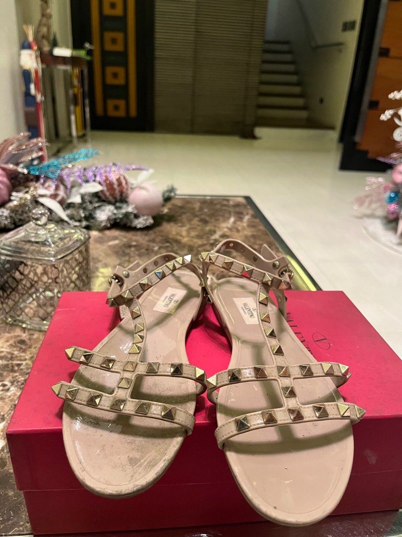 Valentino Beige Jelly Flats (Category: Flats & Sandals) located in Quezon City. Submitted by dayanny (Listing ID 1401884766, Image 1). Description: Guaranteed Authentic, Personal Pair issue: tarnished back of the metal stud, need to repair strap -Price nego for sure buyers.