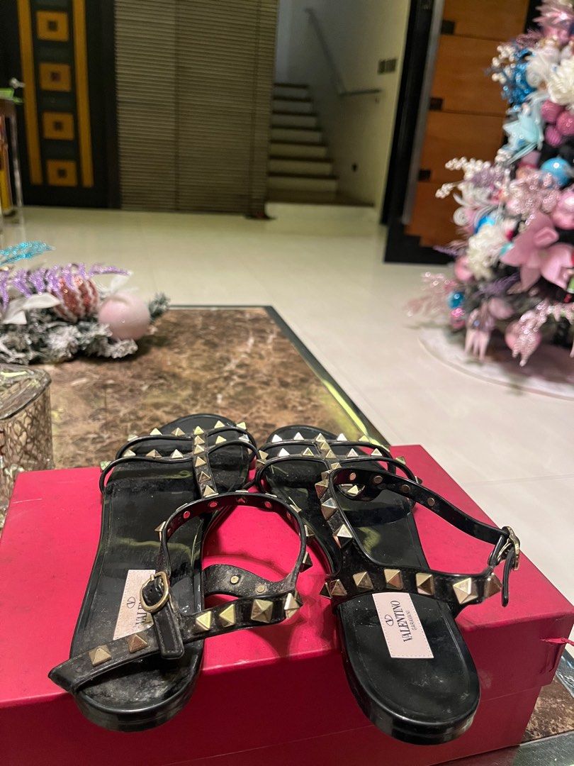 Valentino Black Jelly Flats (Category: Flats & Sandals) located in Quezon City. Submitted by dayanny (Listing ID 1401884536, Image 2). Description: Guaranteed Authentic, Personal Pair issue: left pair’s strap is detached, for repair, needs cleaning -Price nego for sure buyers .