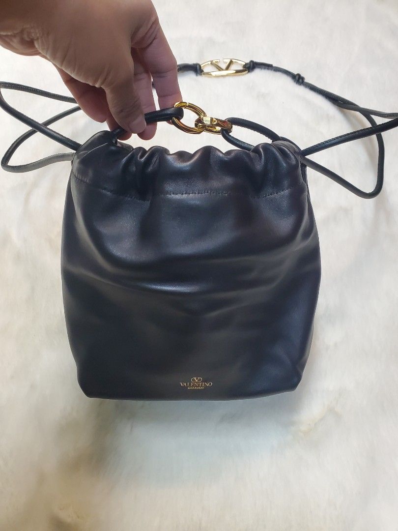 Valentino Garavani Drawstring Crossbody Bag (Category: Luxury Bags & Wallets) located in Manila. Submitted by mavel0817 (Listing ID 1401755893, Image 1). Description: Valentino Garavani drawstring Genuine Leather etikita.