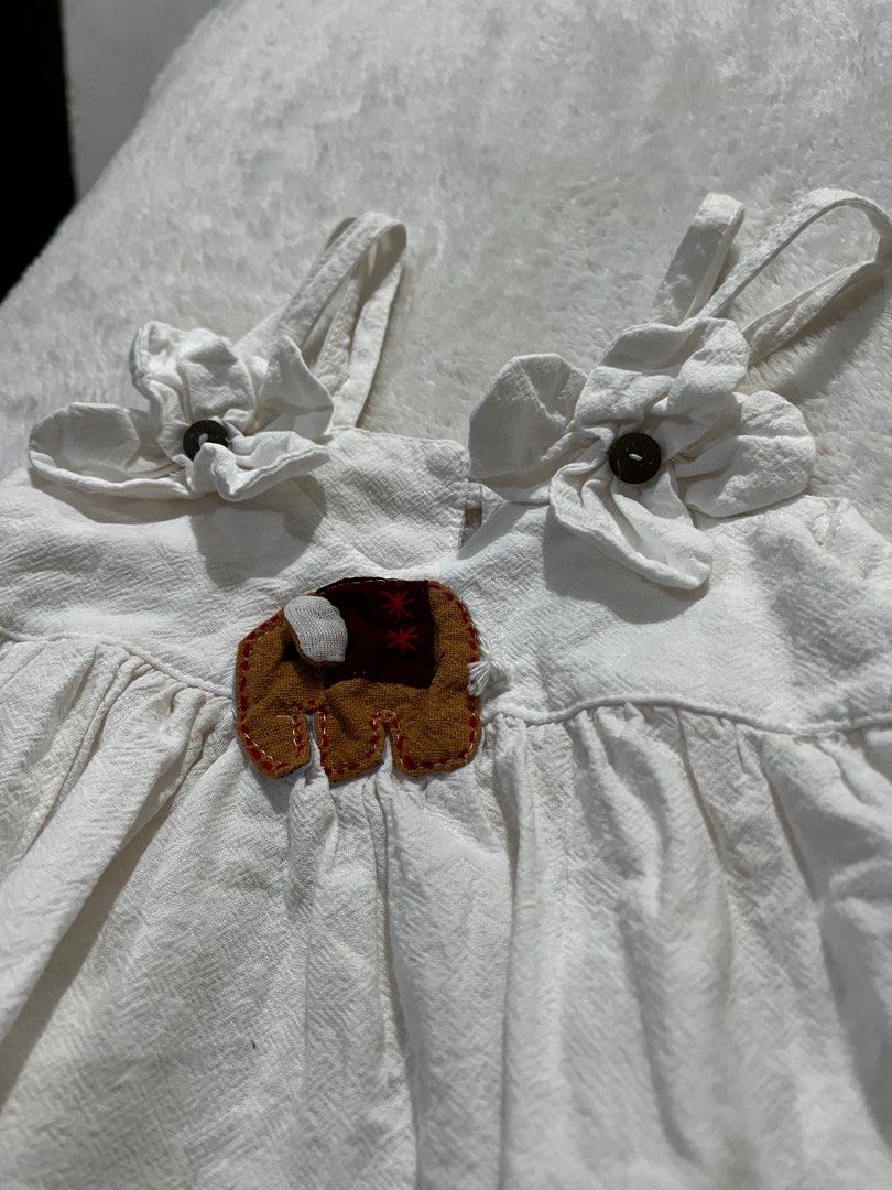 White dress for baby (Category: Babies & Kids Fashion) located in Marikina City. Submitted by smause (Listing ID 1401875234, Image 2). Description: No brand pero maganda tela Size: 80cm .