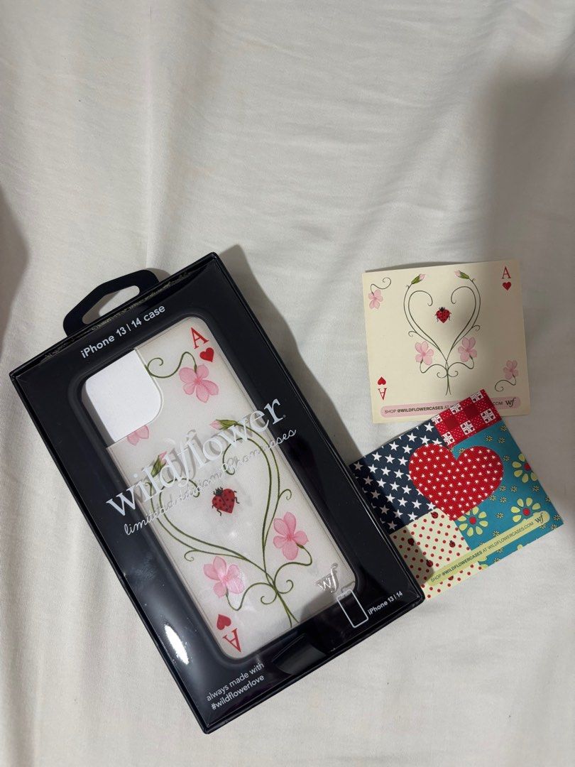 Wildflower IPhone 13/14 Case x Lily Moss (Category: Cases & Sleeves) located in Manila. Submitted by sabinayu (Listing ID 1401894919, Image 1). Description: 🏷️ WF X LILY MOSS IPhone 13/14 ₱2,500 ❤️ Alabang Location 😊 RFS : Wrong Size.