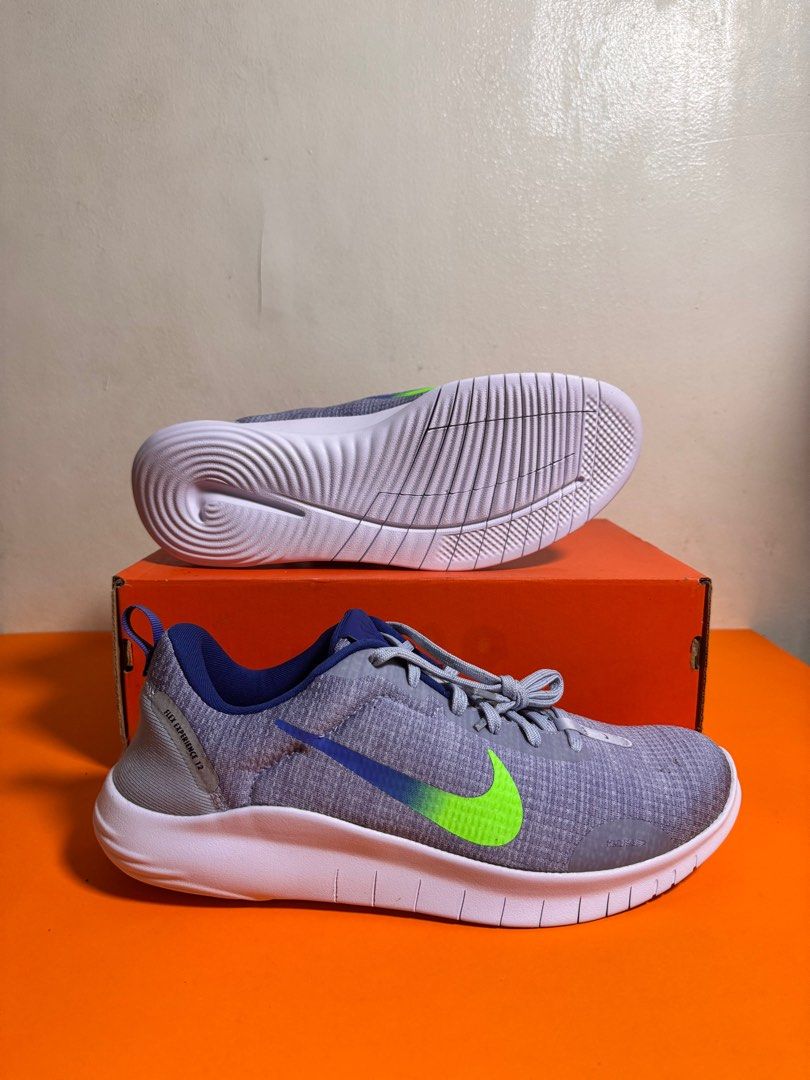 [AUTHENTIC | NEW] Nike Flex Experience Run 12 Sneakers (Category: Sneakers) located in Makati City. Submitted by abstanding (Listing ID 1405309964, Image 3). Description: [AUTHENTIC | NEW] Nike Flex Experience Run 12 Sneakers - Brand new - Mens (US10.5 / UK9.5 / EUR44.5) - Color: LT ARMORY BLUE / STAR BLUE / BLEU ARMURE CLR / BLEU STAR - Features a gray and blue color scheme with a neon green swoosh. - Includes original box. - The shoes have a fl