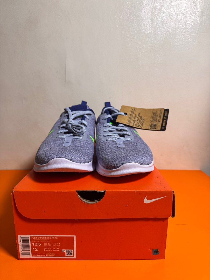 [AUTHENTIC | NEW] Nike Flex Experience Run 12 Sneakers (Category: Sneakers) located in Makati City. Submitted by abstanding (Listing ID 1405309964, Image 2). Description: [AUTHENTIC | NEW] Nike Flex Experience Run 12 Sneakers - Brand new - Mens (US10.5 / UK9.5 / EUR44.5) - Color: LT ARMORY BLUE / STAR BLUE / BLEU ARMURE CLR / BLEU STAR - Features a gray and blue color scheme with a neon green swoosh. - Includes original box. - The shoes have a fl