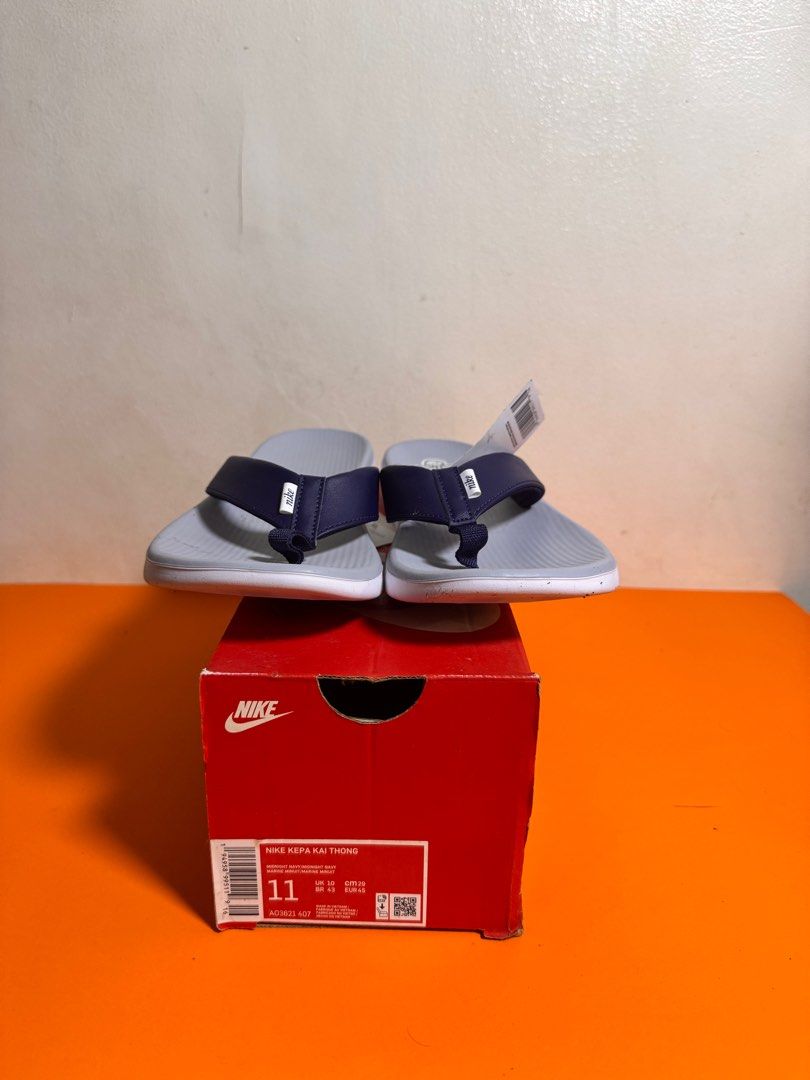 [AUTHENTIC | NEW] Nike Kepa Kai Thong Slides (Category: Slippers & Slides) located in Makati City. Submitted by abstanding (Listing ID 1405287633, Image 2). Description: [AUTHENTIC | NEW] Nike Kepa Kai Thong Slides - Brand new - Mens (US11 / UK10 / EUR45) - Color: Midnight Navy / Marine Minuit - Includes original box and tag - Comfortable and durable.