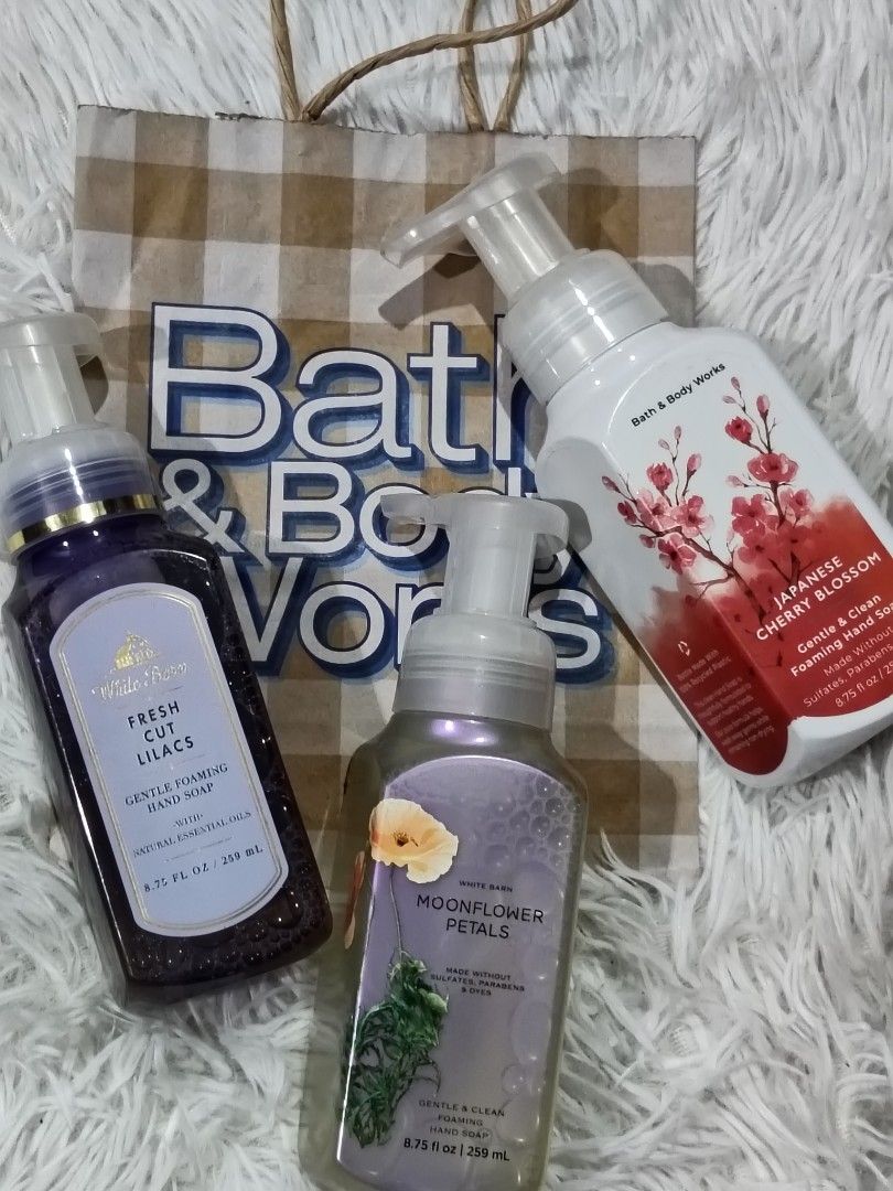 Bath & Body Works Hand Soap - Assorted Scents (Category: Bath) located in Manila. Submitted by rustmakeupinc (Listing ID 1405315321, Image 1). Description: Set of three Bath & Body Works foaming hand soaps. Includes scents: Fresh Cut Lilacs, Moonflower Petals, and Japanese Cherry Blossom. Each bottle contains 8.75 fl oz / 259 mL. Perfect for adding a touch of fragrance to your bathroom or kitchen. Great as a gift or for personal use..