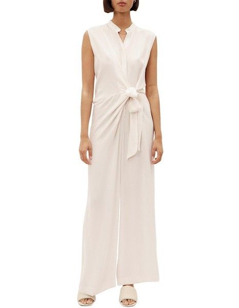 Brand New Ginger & Smart Cursive 100% Silk Jumpsuit (Category: Women's Clothes) located in Sydney. Submitted by desirably (Listing ID 1405330100, Image 2). Description: Brand New Ginger&Smart Cursive 100% Silk Jumpsuit(Colour Shell) for $220(RRP $595). Size 10, would fit 10-12. Brand New with Tags. This sexy wrap effect jumpsuit has a button through front and a sarong style tie with a flattering effect for waist and hips. - Crafted from 100% silk