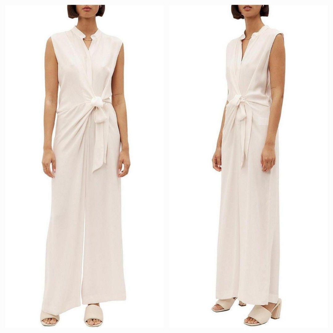 Brand New Ginger & Smart Cursive 100% Silk Jumpsuit (Category: Women's Clothes) located in Sydney. Submitted by desirably (Listing ID 1405330100, Image 1). Description: Brand New Ginger&Smart Cursive 100% Silk Jumpsuit(Colour Shell) for $220(RRP $595). Size 10, would fit 10-12. Brand New with Tags. This sexy wrap effect jumpsuit has a button through front and a sarong style tie with a flattering effect for waist and hips. - Crafted from 100% silk
