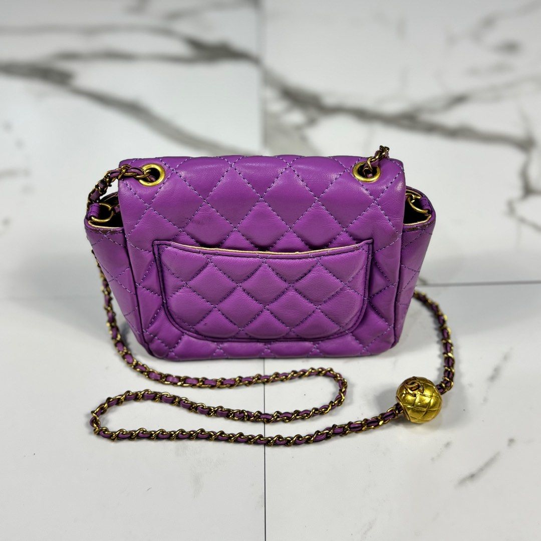 Chanel - Mini Classic Flap Square - Shoulder Bag (Category: Luxury Bags & Wallets) located in Dasmarinas. Submitted by F_A_Q (Listing ID 1405289528, Image 2). Description: ONE SIZE - 8 In. Width - 5.5 In. Length - 2.5 In. Depth RANK B No inclusions Please check details for some minor flaws - purple quilted lambskin leather with gold-tone hardwar. .
