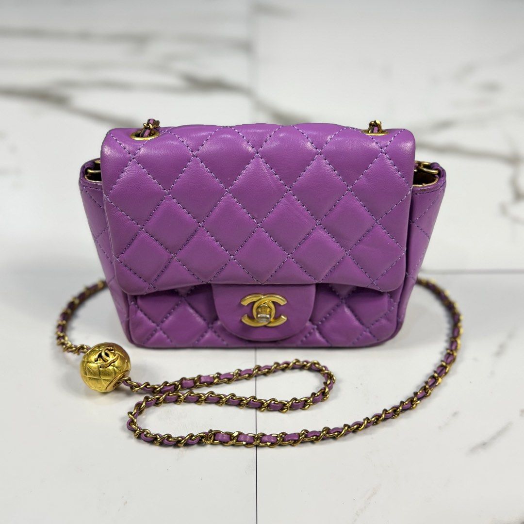 Chanel - Mini Classic Flap Square - Shoulder Bag (Category: Luxury Bags & Wallets) located in Dasmarinas. Submitted by F_A_Q (Listing ID 1405289528, Image 1). Description: ONE SIZE - 8 In. Width - 5.5 In. Length - 2.5 In. Depth RANK B No inclusions Please check details for some minor flaws - purple quilted lambskin leather with gold-tone hardwar. .