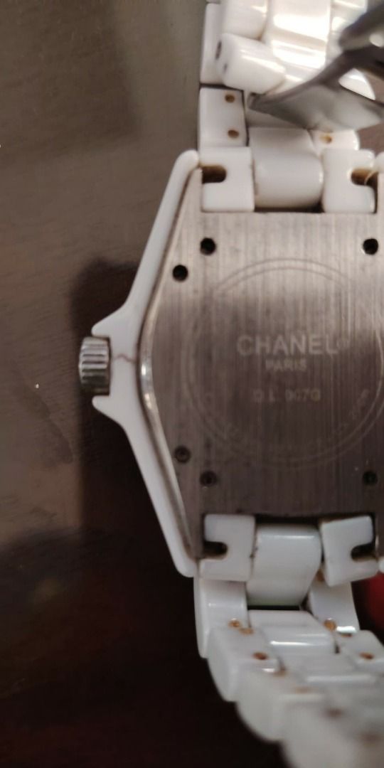 Chanel J12 White Ceramic Diamond Watch (Category: Luxury Watches) located in Cavite. Submitted by blackrain4 (Listing ID 1405239794, Image 2). Description: Elegant Chanel J12 watch with a white ceramic strap and bezel. The watch face features diamond accents and the Chanel logo. It has a date display at the 4 o'clock position. The watch is Swiss made. It is has been stock inside my mother's drawer and I will be selling it. Negotiable. Call or tex