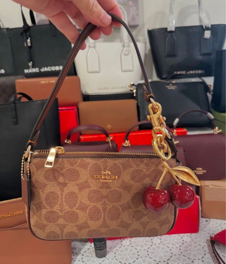 Coach Cherry Bag Charm (Category: Luxury Bags & Wallets) located in Manila. Submitted by msddirectfactoryoutlet (Listing ID 1405267262, Image 1). Description: .