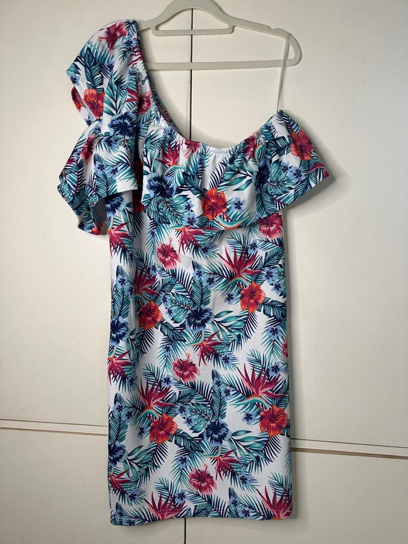 Floral One-Shoulder Dress 3XL (Category: Dresses) located in Manila. Submitted by plus2present.preloves (Listing ID 1405260607, Image 1). Description: - Size: 3XL - Design: One-shoulder with floral print - Features: Ruffled neckline, straight silhouette - Fabric: Lightweight - Ideal for: Casual outings, tropical vacations.