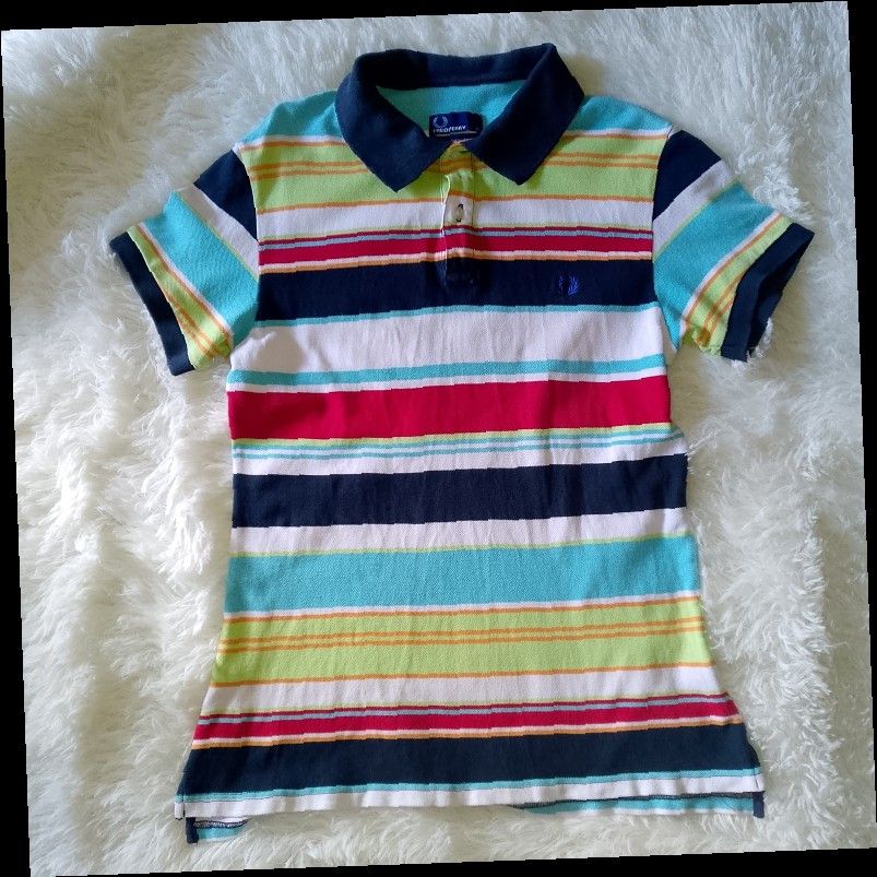 Fredperry Polo shirt with stripe (Category: Shirts) located in Davao. Submitted by lee_ly (Listing ID 1405224564, Image 1). Description: Lightly used xl on tag with minimal collar line.