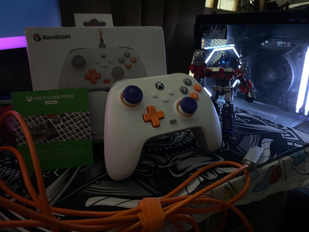 GameSir T7 xbox (Category: Controllers) located in Valenzuela. Submitted by raintransformed (Listing ID 1405298510, Image 1). Description: - GameSir t7 wired controller - Stylish white body with orange and purple buttons - Includes original box - Comes with an Xbox Game Pass ultimate for 1 month card - Wired connection for reliable gaming.
