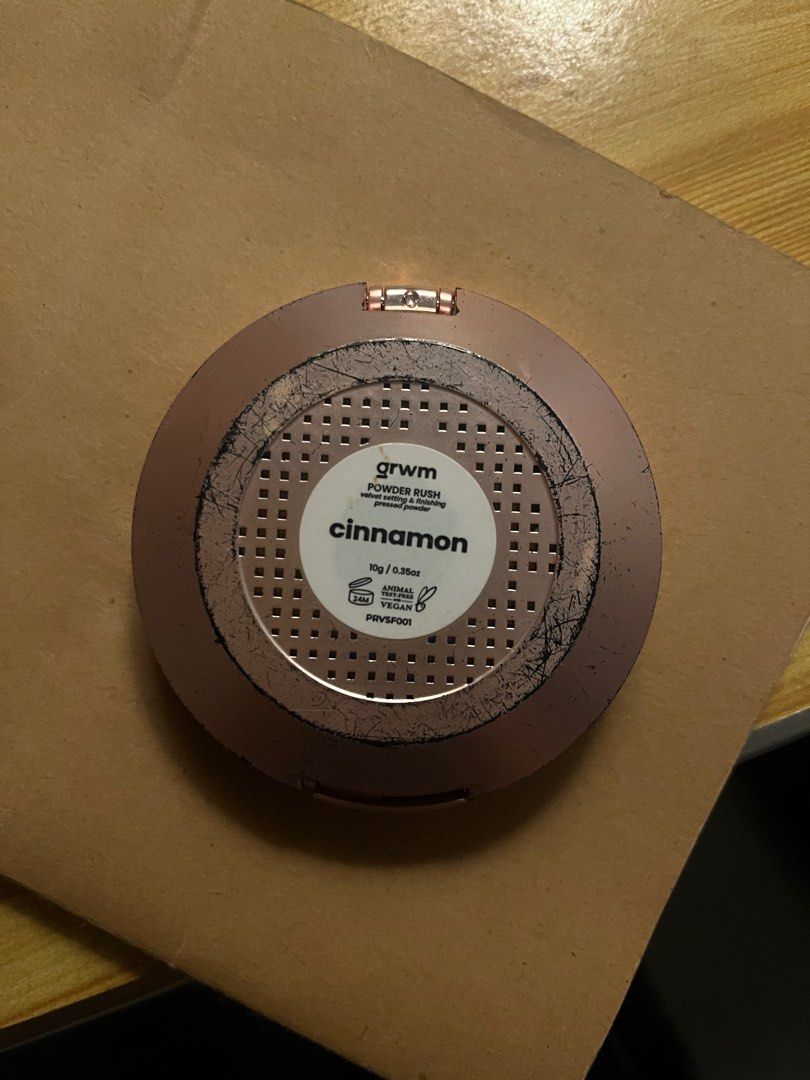 GRWM Powder Rush Cinnamon (Category: Makeup) located in Pagsanjan. Submitted by luandeclutter (Listing ID 1405299908, Image 2). Description: - Chromaesthetics GRWM Powder Rush in Cinnamon - Pressed powder - 10g / 0.35oz - Compact has a rose gold rim - Includes a mirror - Visible cracks on the powder.