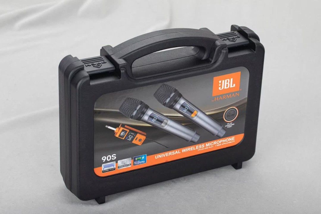 JBL 90S Universal Wireless Microphone (Category: Microphones) located in Manila. Submitted by iliasjen3082126 (Listing ID 1405333345, Image 2). Description: JBL 90S universal wireless microphone set includes two microphones, a receiver, charging cable, and accessories. It comes in a hard carrying case for easy storage and transport. The microphones have an LCD screen and a DC-5V charging port. The set also includes batteries and microphone stands