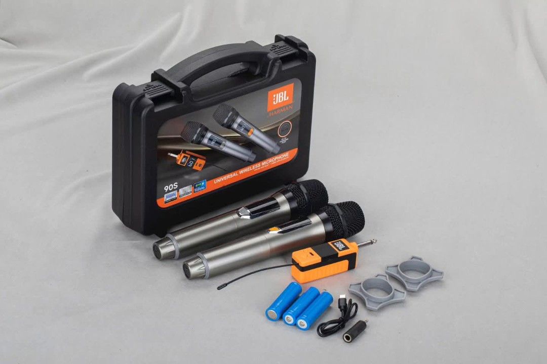 JBL 90S Universal Wireless Microphone (Category: Microphones) located in Manila. Submitted by iliasjen3082126 (Listing ID 1405333345, Image 1). Description: JBL 90S universal wireless microphone set includes two microphones, a receiver, charging cable, and accessories. It comes in a hard carrying case for easy storage and transport. The microphones have an LCD screen and a DC-5V charging port. The set also includes batteries and microphone stands