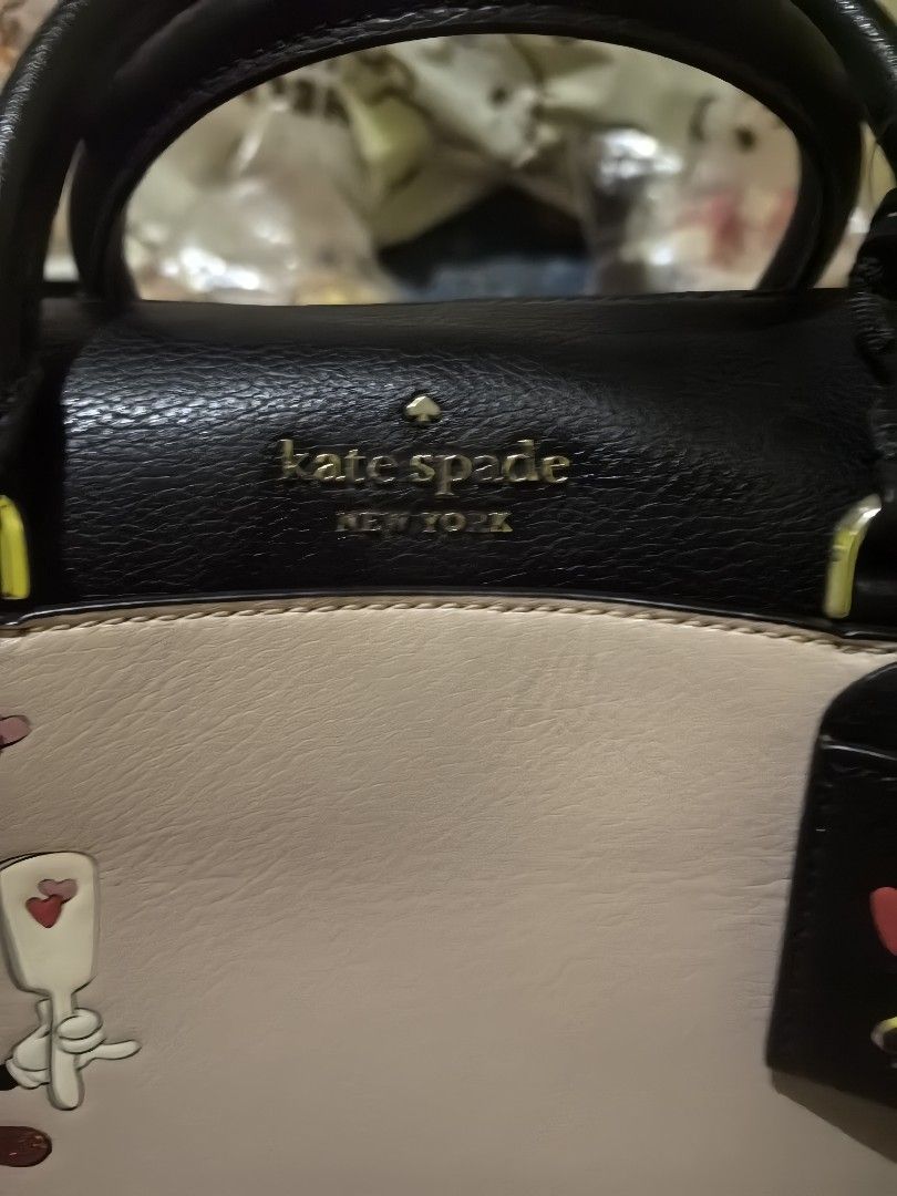 Kate Spade x Disney sling bag (Category: Luxury Bags & Wallets) located in Quezon City. Submitted by uptrendglam (Listing ID 1405298183, Image 3). Description: Kate Spade collab with Disney sling bag with removable strap inclusions are care card and Hangtag. Guaranteed authentic with Kate Spade paperbag for gifting. Please refrain for offering insulting discount up to 70 to 80% off. I would rather have this keep for my collection than to accept s
