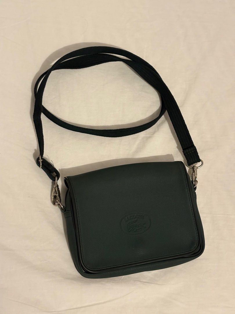 Lacoste Dark Green Bag (Category: Cross-body Bags) located in Paranaque City. Submitted by izzysus (Listing ID 1405281646, Image 2). Description: - excellent condi - DARK GREEN - no marks, leather tears and noticeable marks - rfs: decluttering mop: gcash/maya.