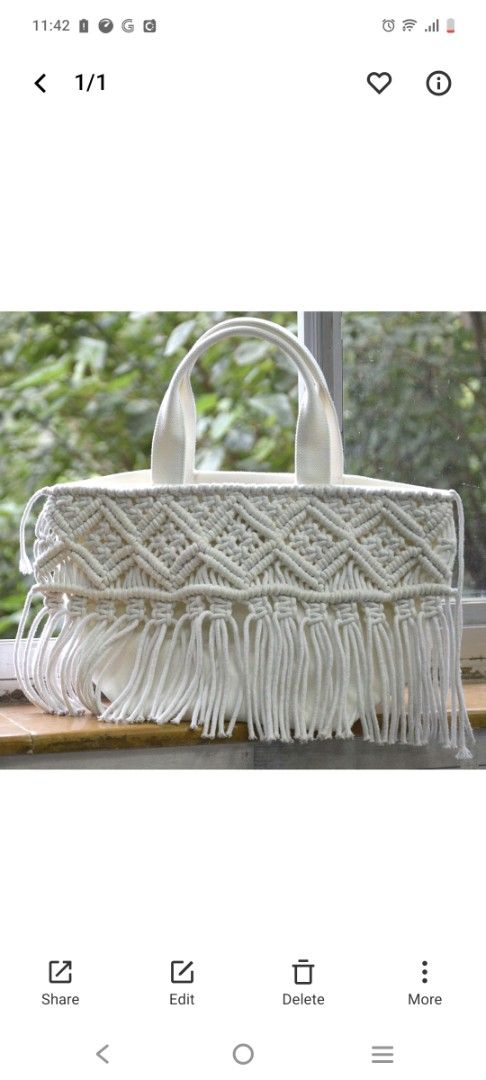 Macrame Fringe Handbag (Category: Shoulder Bags) located in Antipolo. Submitted by thethriftmarket (Listing ID 1405227025, Image 2). Description: Bayflow bag from Japan - Unique macrame design with fringe - Sturdy handles - Spacious interior - Inner pocket for organization - Magnetic snap closure - Versatile neutral color.