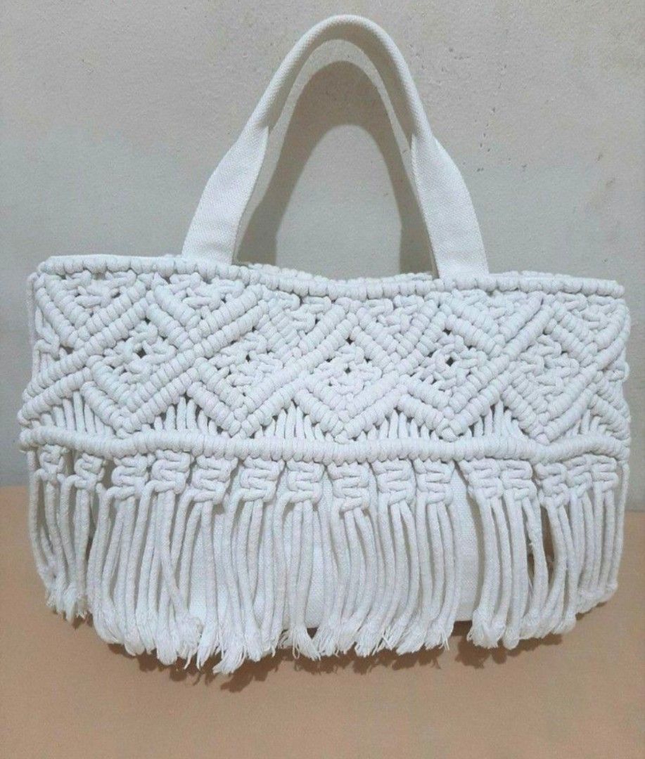 Macrame Fringe Handbag (Category: Shoulder Bags) located in Antipolo. Submitted by thethriftmarket (Listing ID 1405227025, Image 3). Description: Bayflow bag from Japan - Unique macrame design with fringe - Sturdy handles - Spacious interior - Inner pocket for organization - Magnetic snap closure - Versatile neutral color.