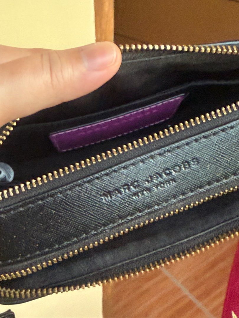 Marc Jacobs The Box Bag in PURPLE (Category: Luxury Bags & Wallets) located in Paranaque City. Submitted by lyn0618 (Listing ID 1405260566, Image 2). Description: FOR SALE. AUTHENTIC MARC JACOBS camera /box bag in PURPLE. Personal PRE LOVED. Used not Abused. GOLD HARDWARES Marc Jacobs ENGRAVED YKK ZIPPER. See pictures for transparency of its AUTHENTICITY. All gold hardwares engraved with MARC JACOBS 2 Compartments can fit IPHONE 17 Or 16 pro max 