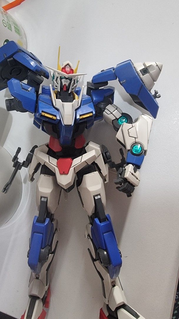 MG Gundam seven swords 00 raiser (Category: Gundam & Model Kits) located in Manila. Submitted by blizzardstan (Listing ID 1405190382, Image 1). Description: - Gundam 00 Qan[T] model kit - Features a white, blue, and red color scheme - Partially assemble - issue missing parts selling as is - Detailed parts and articulation - Includes various components and accessories - Great for Gundam enthusiasts.