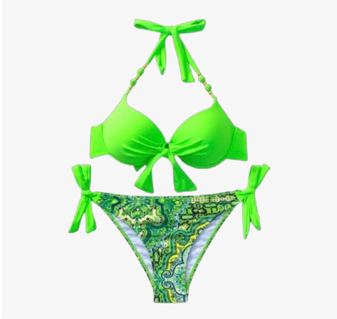 Neon Green Bikini Set (Category: Bikinis & Swimsuits) located in Manila. Submitted by purpleeeshop (Listing ID 1405259587, Image 1). Description: - Neon green bikini set - Top features a bow detail and halter straps - Bottoms have a green paisley print - Tie-side bottoms - Stylish swimwear for beach or pool.
