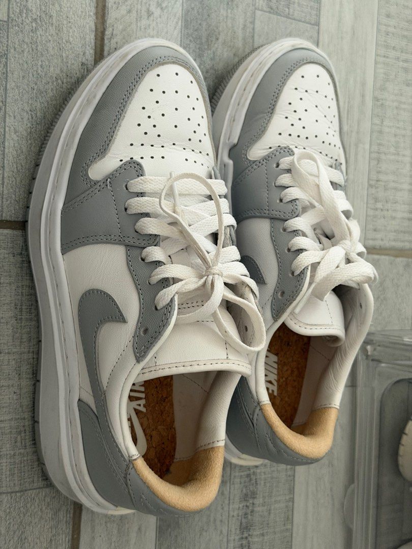 Nike Air Jordan 1 Low Elevate Wolf Grey (W) (Category: Sneakers) located in Antipolo. Submitted by feifeitep (Listing ID 1405191224, Image 2). Description: - Nike Air Jordan 1 Low Elevate US 7.5 - Color: Wolf Grey (White and Grey) - Design: Perforated toe box, thick sole - Details: Nike Air logo on tongue, white laces, grey swoosh - Insole: Cork-like material - RFS: decluttering - NO BOX just shoes.