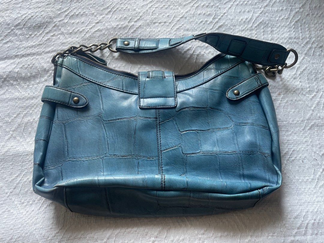 Nine West Blue Handbag (Category: Shoulder Bags) located in Cainta. Submitted by robbynt (Listing ID 1405197884, Image 3). Description: 👗👟👜 Part of my closet clean-out! Letting go of some of my faves — all preloved and in great shape. From my closet to yours. 😊 ✅ Color - Blue ✅ Size - medium ✅ Bag type - shoulder ✅ Bag closure - zipper ✅ Hardware - brass ♻️ Location: Cainta, Rizal ♻️ MOP: GCash ♻️ SF: shouldered by buyer via Lalamove or JnT ♻