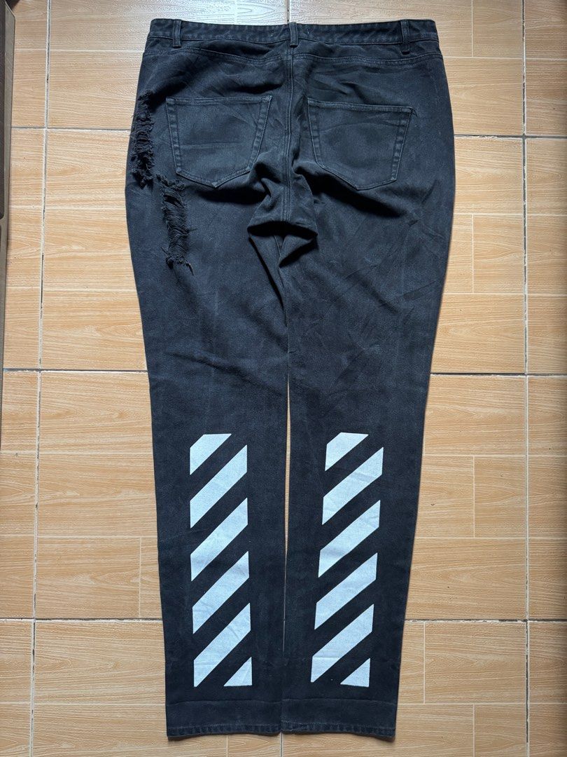 Off White Distressed Pants (Category: Jeans) located in Meycauayan. Submitted by itstimothrifts (Listing ID 1405300156, Image 1). Description: Off White Distressed Pants Excellent Condition Issue on letter I print (seen on pic) Size XL Actual Width 38 Length 44 Leg Opening 7 Front Rise 13.