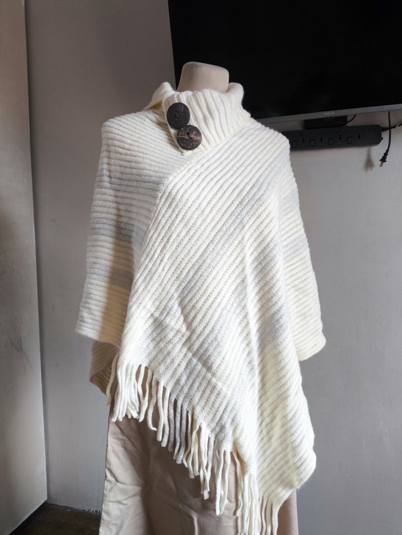Poncho Neck collar with Buttons Knitted Sweater (Category: Coats, Jackets and Outerwear) located in Las Pinas. Submitted by rose.luab (Listing ID 1405181446, Image 1). Description: preloved but well loved knitted Good condition , My sister used it twice when she visited Texas USA.