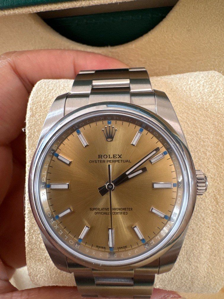 Rolex Oyster Perpetual 114200 (Category: Watches) located in Singapore. Submitted by lambchop__ (Listing ID 1405214794, Image 3). Description: Oyster Perpetual 34- 114200 White Grape dial.