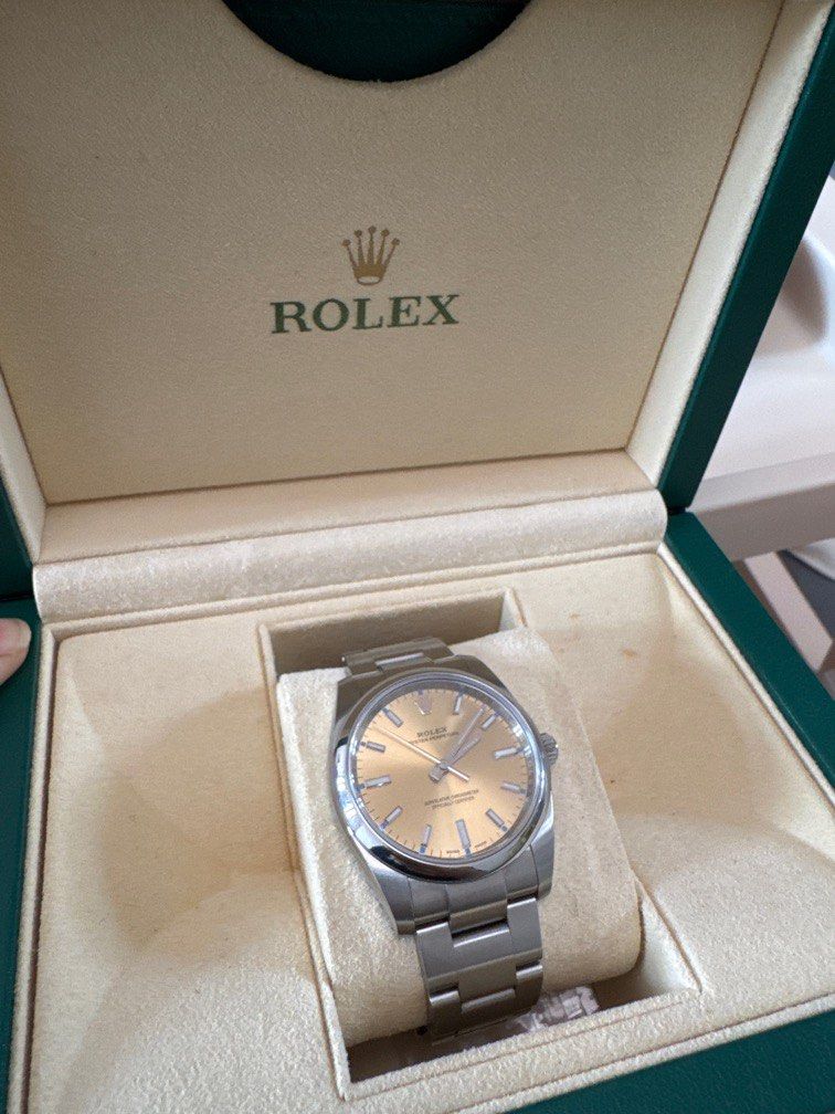 Rolex Oyster Perpetual 114200 (Category: Watches) located in Singapore. Submitted by lambchop__ (Listing ID 1405214794, Image 2). Description: Oyster Perpetual 34- 114200 White Grape dial.