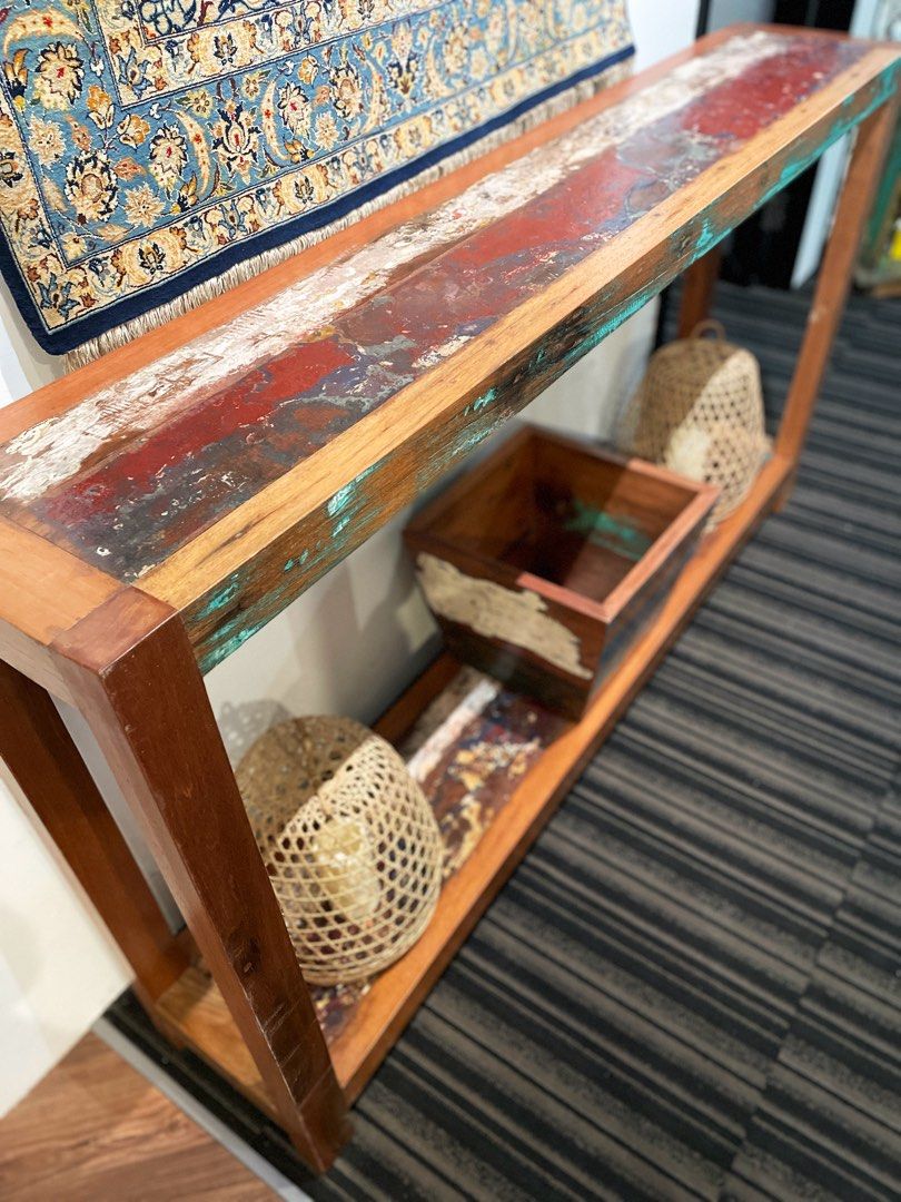 Rustic Solid Wood CONSOLE TABLE (Category: Tables & Sets) located in Singapore. Submitted by zaksg79 (Listing ID 1405268259, Image 2). Description: Size: 160 x 30 x h.90 cm Solid Wood Console Table made in Bali from authentic Boat Wood (recycled hardwoods from traditional Indonesian fishing boats). A one-of-kind piece! Very good condition (showroom piece). Suitable for both indoor & outdoor use. RRP: S$980 **NOW ONLY S$390!!** 60% Discount, Year 