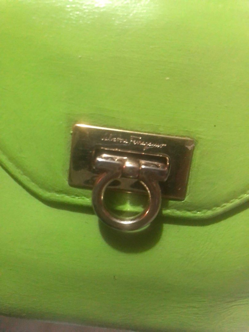 Salvatore Ferragamo Green Leather Wallet (Category: Luxury Bags & Wallets) located in Bacoor. Submitted by well_curated (Listing ID 1405259328, Image 2). Description: - Authentic Salvatore Ferragamo wallet - Vibrant green color - Gold-tone clasp with logo - Multiple card slots - Clear ID window - Made of leather - Serial number visible.