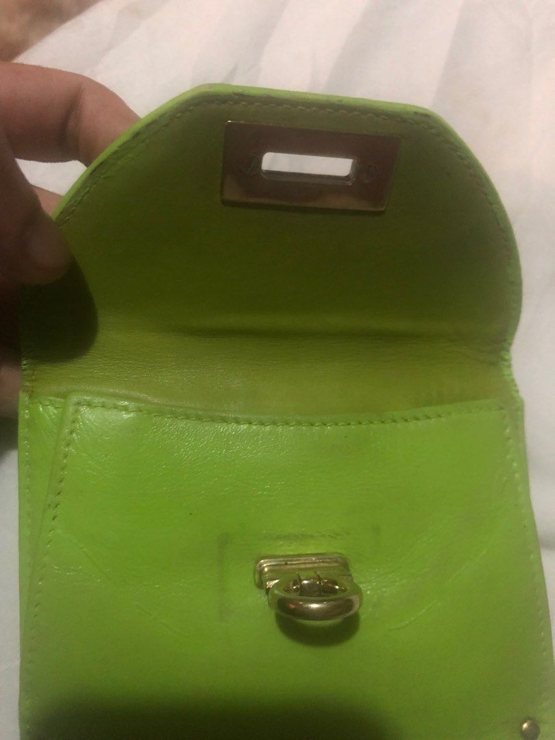 Salvatore Ferragamo Green Leather Wallet (Category: Luxury Bags & Wallets) located in Bacoor. Submitted by well_curated (Listing ID 1405259328, Image 3). Description: - Authentic Salvatore Ferragamo wallet - Vibrant green color - Gold-tone clasp with logo - Multiple card slots - Clear ID window - Made of leather - Serial number visible.