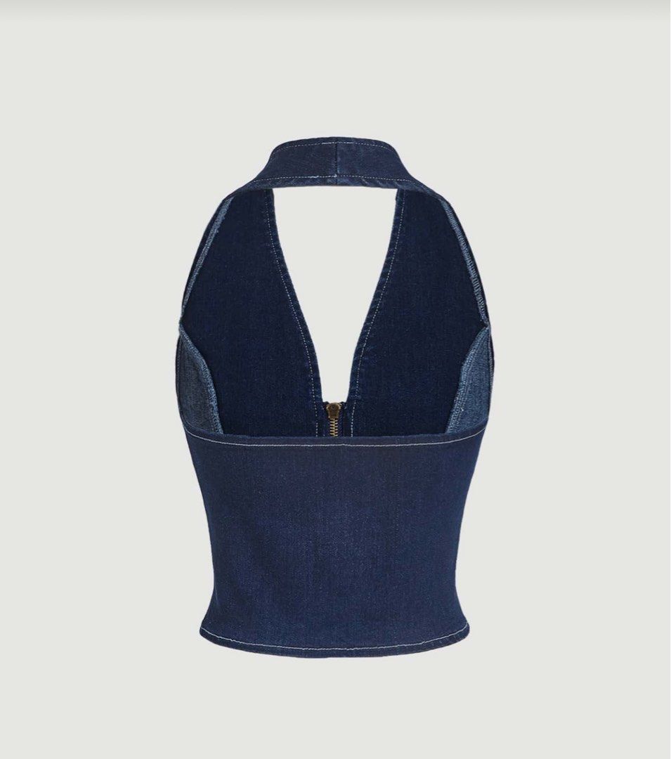 SHEIN Denim Halter Top with Zipper (Category: Sleeveless) located in Manila. Submitted by sl4ying (Listing ID 1405277786, Image 2). Description: - Dark wash denim halter top - Flattering V-neckline - Full-length zipper - Fitted silhouette - Stylish and casual - Back design visible.