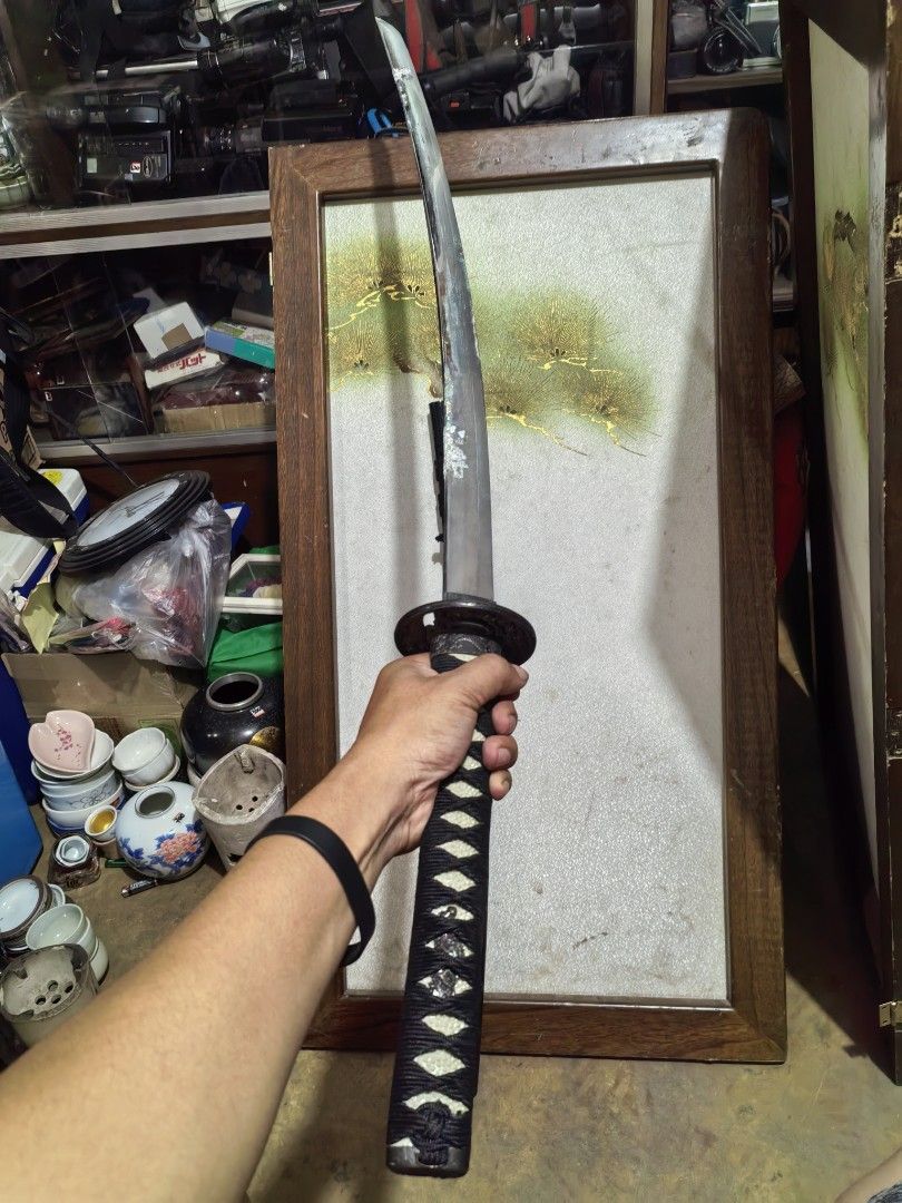 Sword Toy Katana Decorative Display (Category: Vintage Collectibles) located in Cebu City. Submitted by dudes_villanueva (Listing ID 1405327079, Image 3). Description: Long Display S-wor-d. KA-ta-na Decorative Display Metal - No Edge 📌In fair condition. Has metal surface Corrosion. Can be clean and restored. Sold as is. 📌Wooden Saya (Sheath) Length: 39.25 inches.