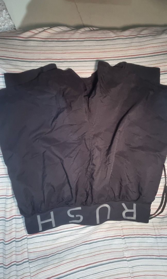 Under Armour 'Rush' Shorts (Category: Shorts) located in Manila. Submitted by blizzardstan (Listing ID 1405203862, Image 2). Description: - Black Under Armour shorts - Under Armour logo on leg and waistband - Drawstring included - Lightweight material drifit shorts with inner - Side split design.
