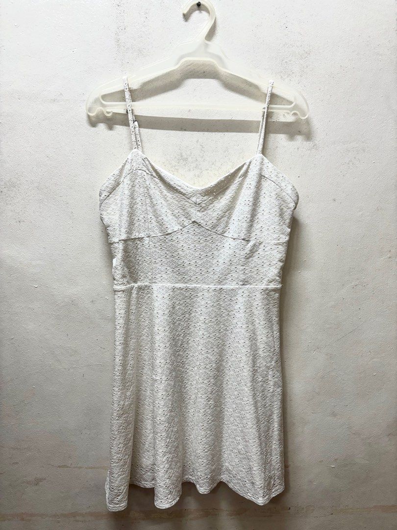 White Eyelet Dress with Cutout Back (Category: Dresses) located in Paranaque City. Submitted by cathsudon (Listing ID 1405170336, Image 1). Description: White Eyelet Dress > A fave! Perfect for dates, sunny events, and brunches > Adjustable spaghetti straps, V-neckline, Cutout back detail > Fitted bodice with flared skirt. Very flattering. > Message for WW > RFS: Decluttering > Price is negotiable MOP: GCash/BPI via QR (will be provided once I ac