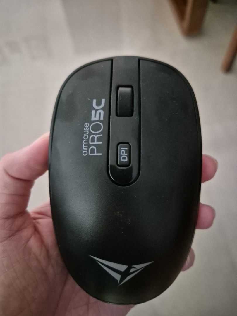 Wireless Mouse (Category: Mouse & Mousepads) located in Singapore. Submitted by hazelbuibui (Listing ID 1405258359, Image 1). Description: - Alcatroz AirMouse Pro5C wireless mouse - Used, in good working condition - Features DPI button - Includes on/off switch - Requires batteries (not included) - Ideal for everyday use.