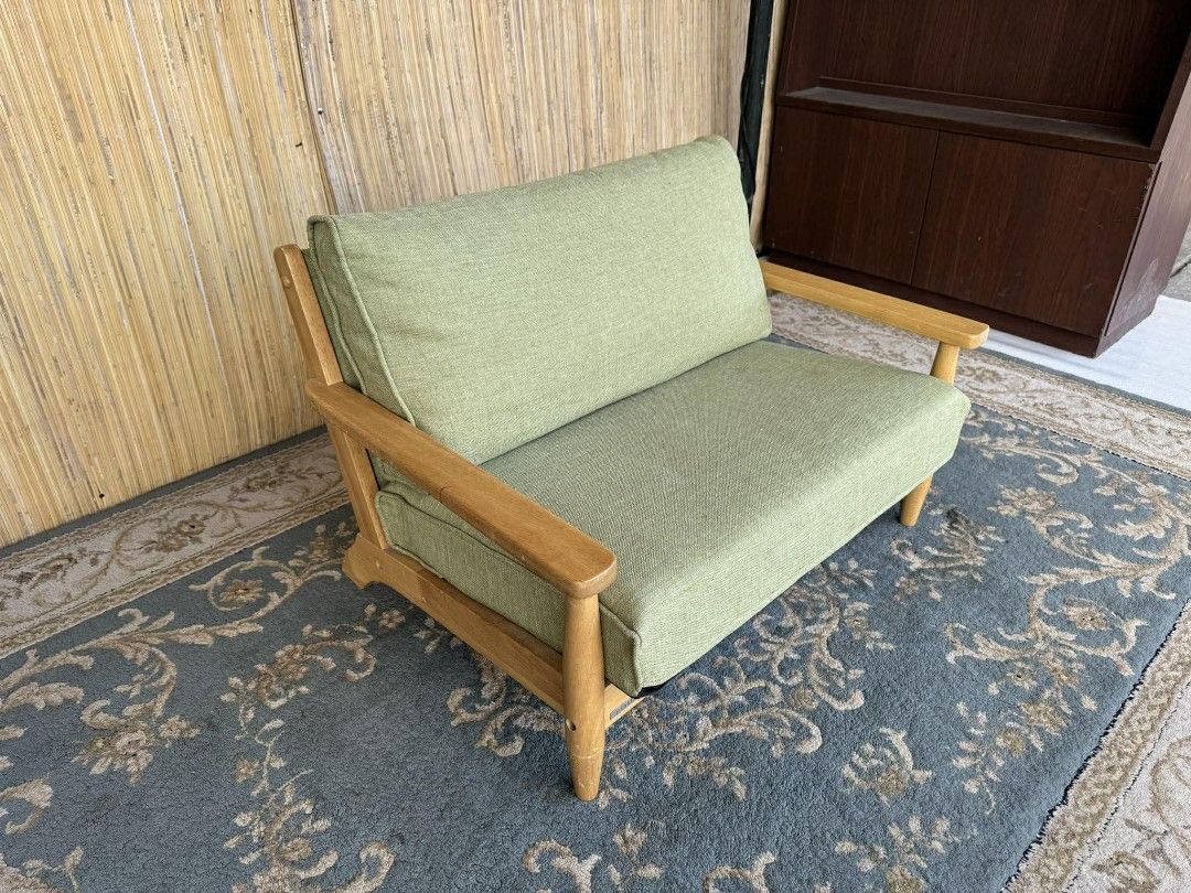 Wooden Frame Sofa with Green Cushions (Category: Sofas) located in Manila. Submitted by eloizavill76462 (Listing ID 1405340504, Image 3). Description: Livart Kids Sofa 2-Seater / Solid Wood Frame L31.5 x W23 x H22/11 In good condition .