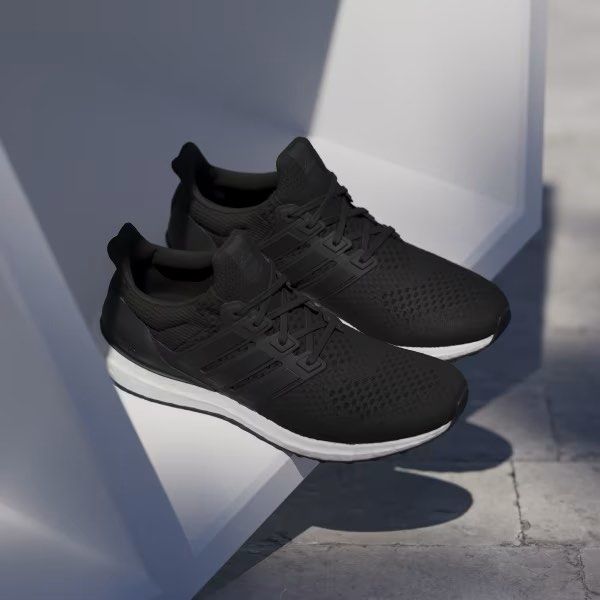 Adidas Ultraboost Black Sneakers (Category: Sneakers) located in Pasig City. Submitted by Great_Finds (Listing ID 1405497820, Image 3). Description: - Adidas Ultraboost sneakers - Black upper with three stripes - White Boost midsole - Lace-up closure - Padded collar for comfort - Heel counter for support - White, cushioned sole - Suitable for running and casual wear - US Size 11 UK 10.5 - SRP = P10,000.