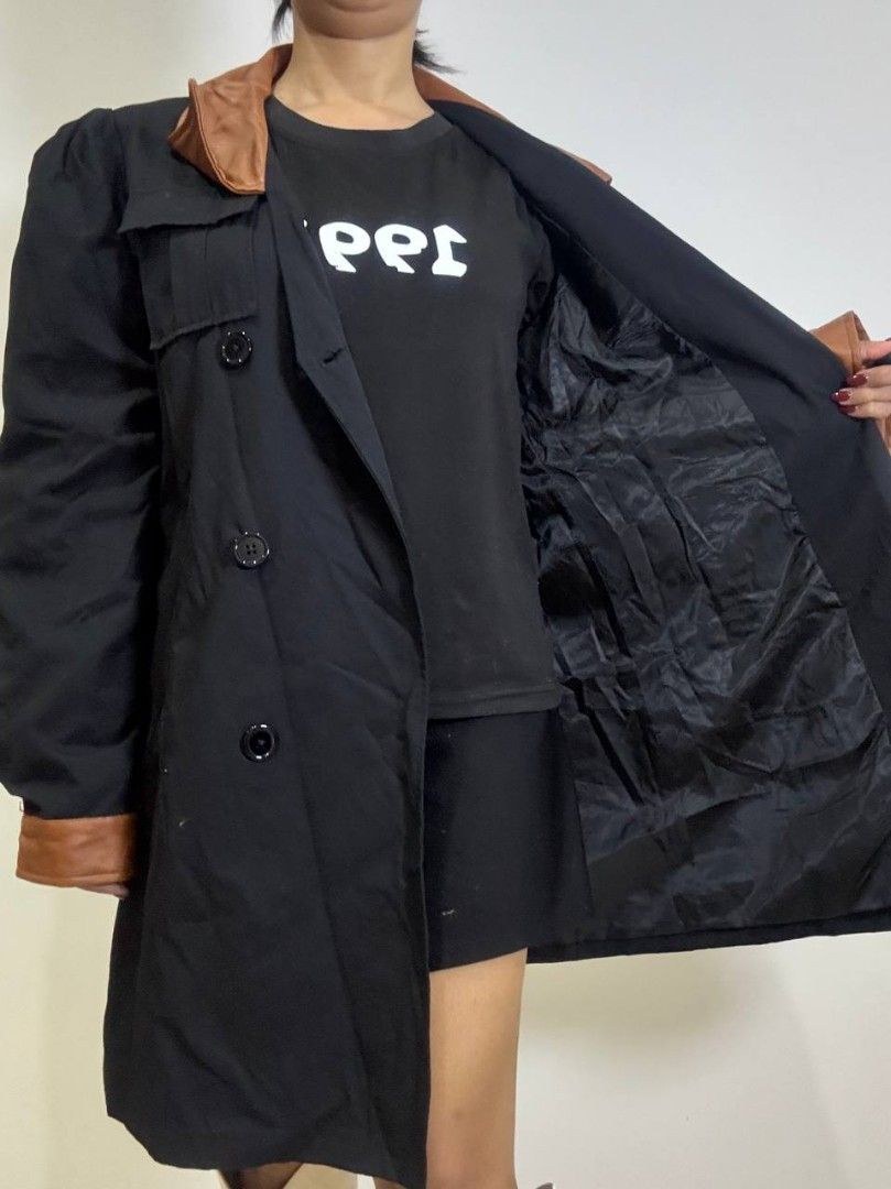 Black Trench Coat with Brown Accents (Category: Coats, Jackets and Outerwear) located in Las Pinas. Submitted by jhhooooo (Listing ID 1405497909, Image 3). Description: - Black trench coat - Brown accents on collar and cuffs - Double-breasted style - Double Lining - Sophisticated and versatile.