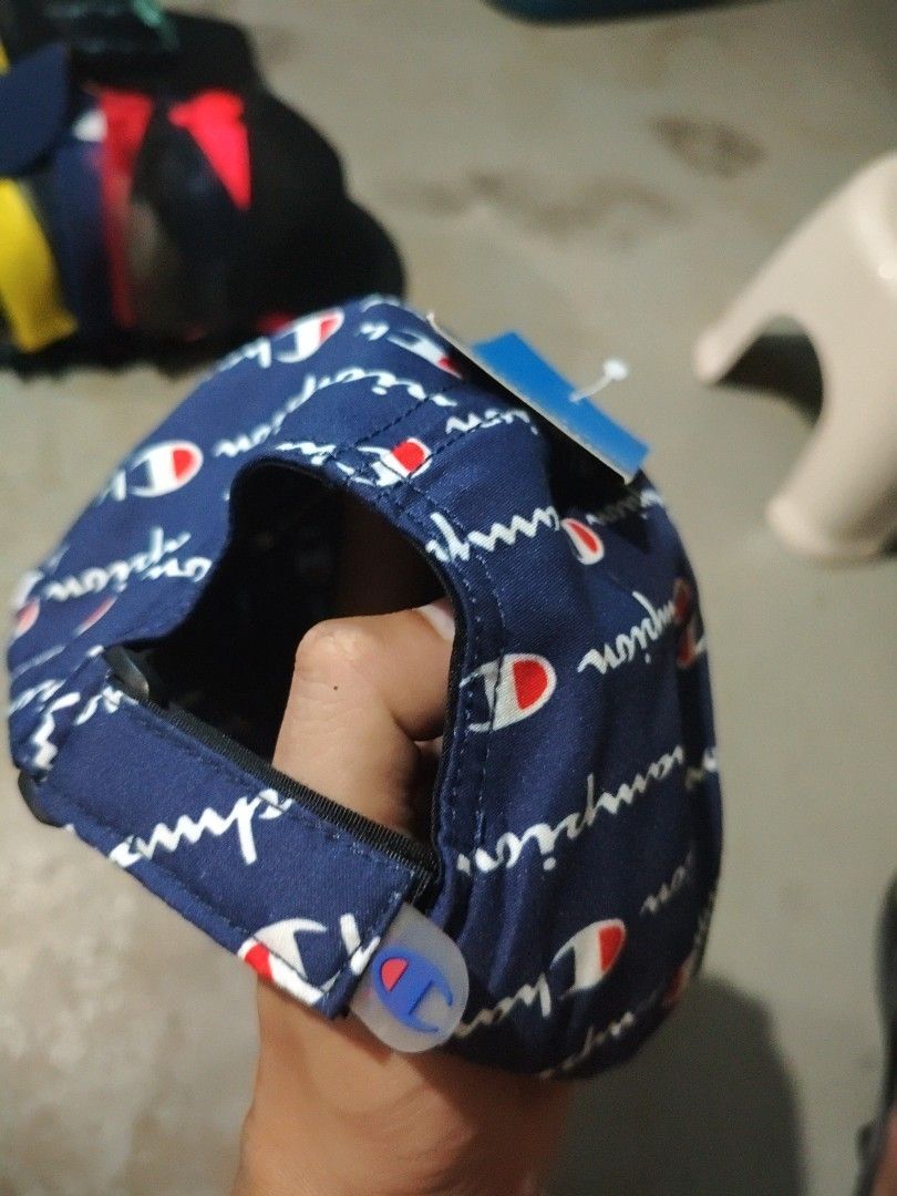 Champion Cap (Category: Caps & Hats) located in San Jose del Monte. Submitted by authenticeraph (Listing ID 1405463038, Image 3). Description: - Navy blue Champion cap - White Champion logo print - Adjustable strap - Curved brim - Classic six-panel design - Includes Champion tag - Uni size.